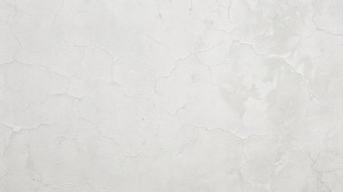 İnce çatlaklar ve yıpranmış yüzeyli hafif beton duvar dokusu