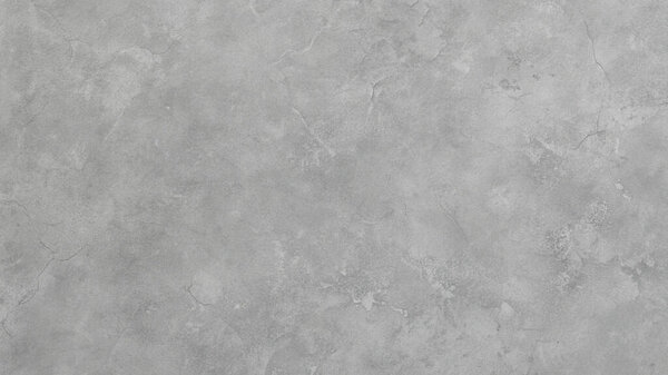 Текстурированная поверхность стены из серого бетона с трещинами и грубым камнем