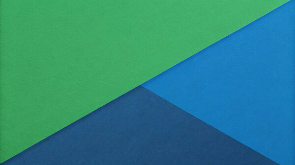 Geometric Background with Blue and Green Paper Texture in Quadrants