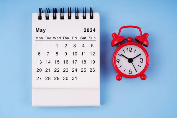 Month, time and calendar concept. Calendar for month of May 2024. On blurred styled background.