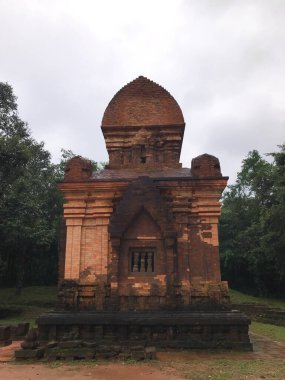 Historical building and religion concept. An ancient temple located in My Son Sanctuary, Danang, Vietnam. clipart