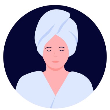 a relaxed woman in a bathrobe and with a towel on her head after taking a shower