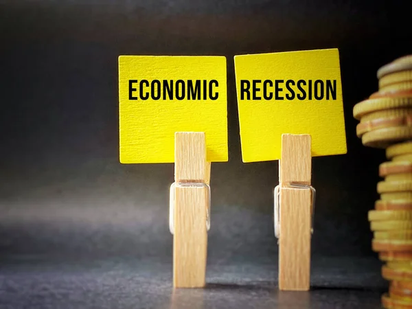 Economic recession text background. Financial management concept.