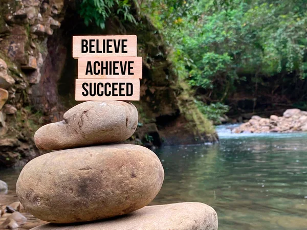 Inspirational Quote Believe Achieve Succeed Text Wooden Blocks Stack Stones — Stock Photo, Image