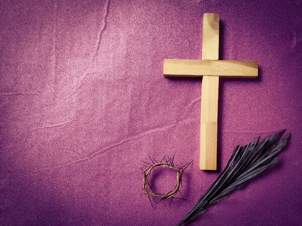 Lent Season,Holy Week and Good Friday concepts - wooden cross image in vintage background. Stock photo.