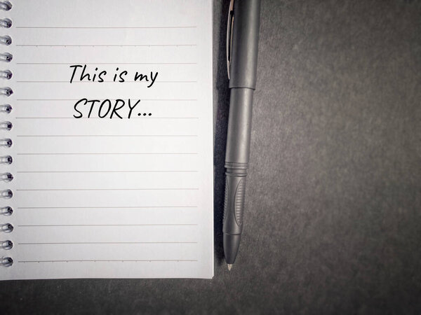 This is my story written on notepad in black background. Journalism concept.
