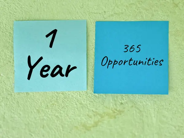 1 year equals 365 opportunities on paper background. Positive inspiration.