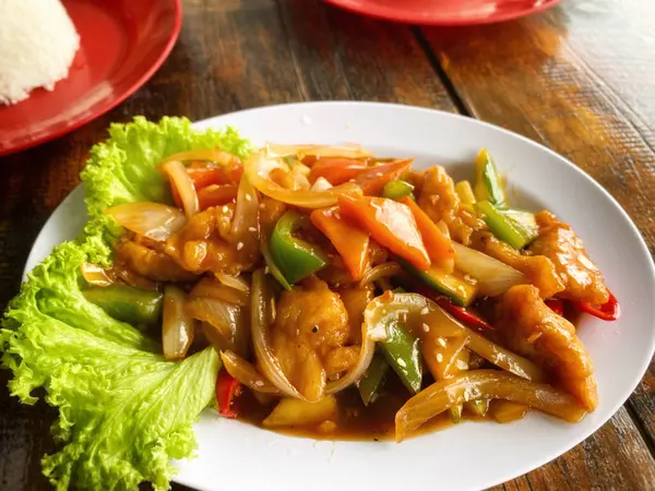 Tatlı ve ekşi tavuk arka planı kapatın. Stok fotoğrafı.