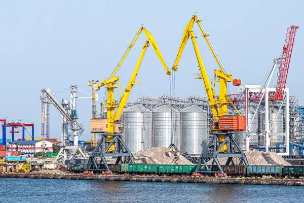 stock image Odessa, Ukraine -08.21. 2019: View of the Odessa sea port. view of harbor cranes and container ships in the largest dock of the port .