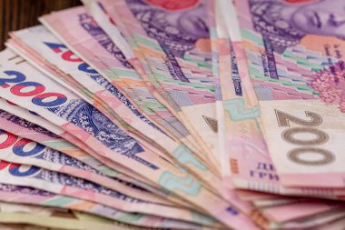 Kağıt para farklı mezhepler, Ukrayna Hryvnia yeni para, dağınık banknotlarla geçmiş. Mali konsept.