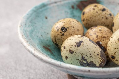 Easter quail eggs.  Spring background with small easter quail eggs. Vintage photo processing