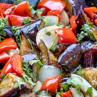 Grilled vegetable salad with zucchini, eggplant, onion, pepper and tomato