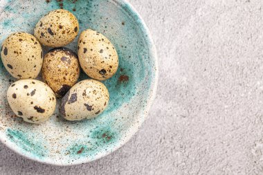 Easter quail eggs.  Spring background with small easter quail eggs. Vintage photo processing
