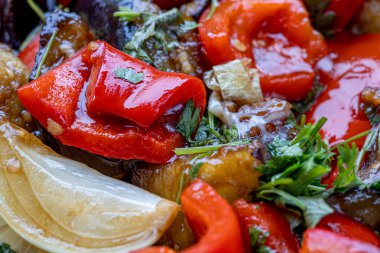 Grilled vegetable salad with zucchini, eggplant, onion, pepper and tomato