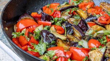 Grilled vegetable salad with zucchini, eggplant, onion, pepper and tomato