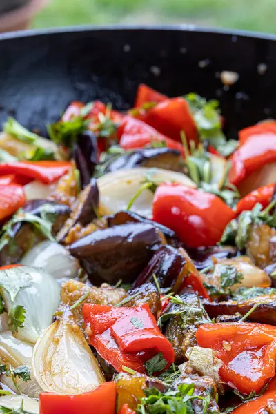 Grilled vegetable salad with zucchini, eggplant, onion, pepper and tomato