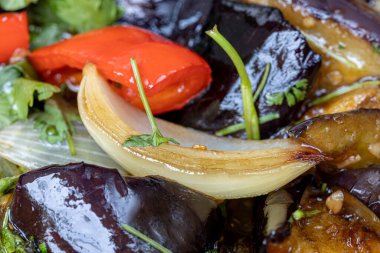 Grilled vegetable salad with zucchini, eggplant, onion, pepper and tomato