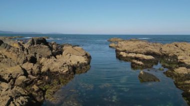 Caion 'da, İspanya' da bir Corua 'da, Rocky Beach' te. Geri çekilme 