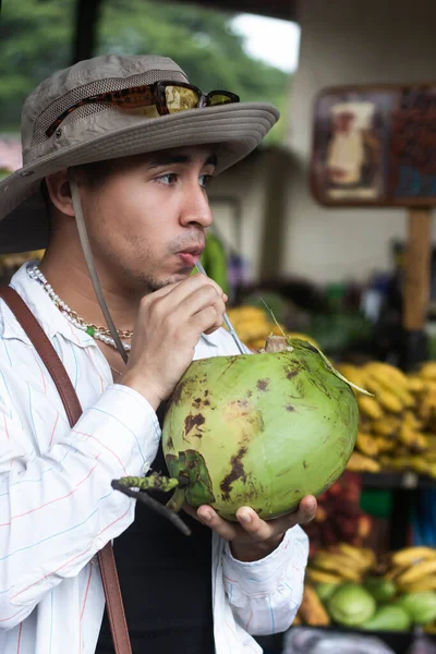 Latin Young Man Drinking Coconut Water Market — Stock Photo, Image