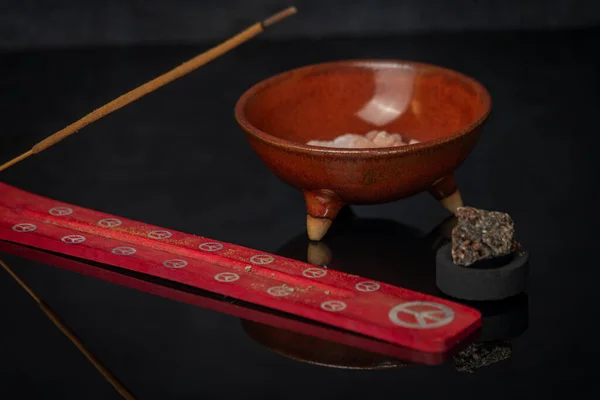 stock image Aromatic stick and gum olibanum on shiny black table