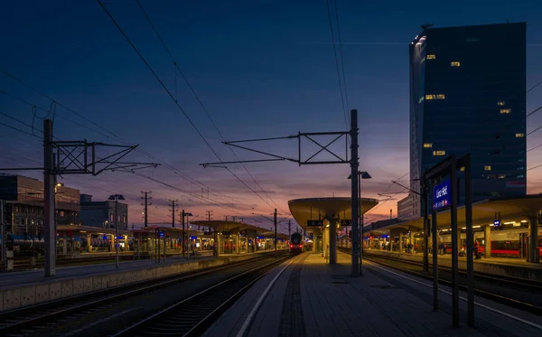 stock image Linz railway station in color autumn evening after nice sunset