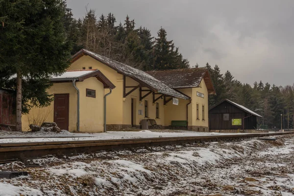 Narrow gauge railway in Ceska Kanada mountains in south Bohemia in winter day