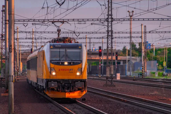 stock image Train in color summer evening in hot Ostrava CZ 07 20 2023