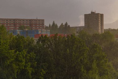 Buildings block of flats in storm with big rain in Liberec CZ 07 11 2024 clipart