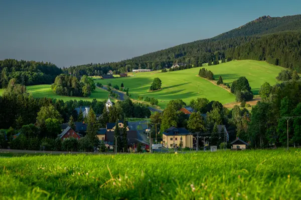 stock image Green meadow with summer hills and villages in Ostruzna CZ 07 19 2024