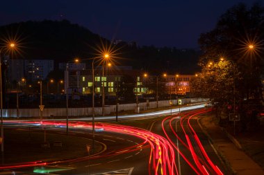 Roundabout road and roads in autumn cold evening in Usti nad Labem CZ 11 01 2024 clipart