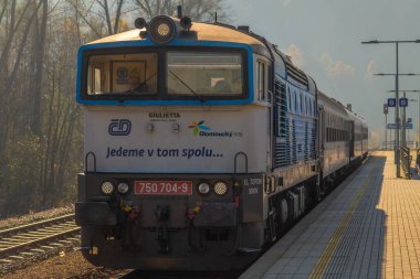 Passenger trains on railway track after flooding in autumn day in Ruda nad Moravou CZ 11 09 2024 clipart