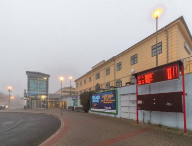 Railway station with big building in frosty autumn morning in station Zabreh CZ 11 10 2024 clipart