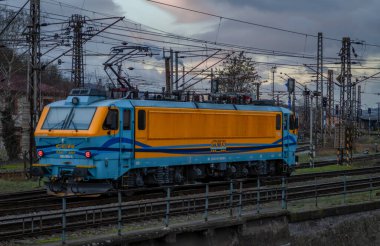 Trains in winter cold dark cloudy day in Usti nad Labem CZ 12 24 2024 clipart