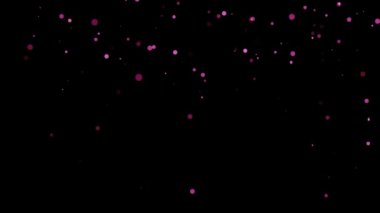 S büyüklüğünde parlak pembe parçacıkların döküldüğü bir video.