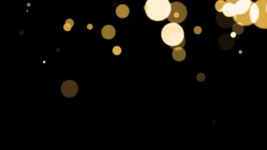 Işıl ışıl sarı parçacıkların L büyüklüğünde bir video.