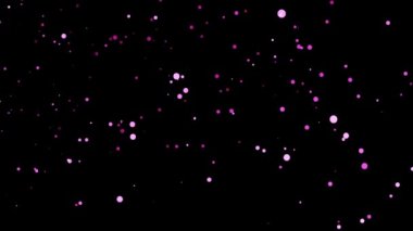Renkli parlayan parçacıkların olduğu bir video.