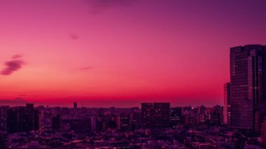 Video of sky, clouds, city and buildings, night view from sunset