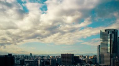 Video of sky, clouds, city and buildings, daytime