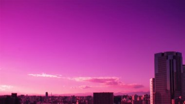 Video of the sky, clouds, towns and buildings, from daytime to sunset