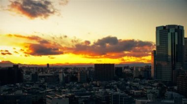 Video of sky, clouds, city and buildings, night view from sunset