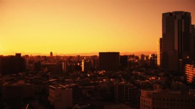 Video of sky, clouds, city and buildings, night view from sunset