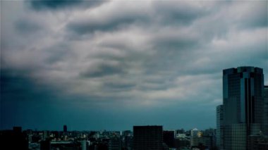 Video of sky, clouds, city and buildings, daytime
