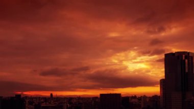 Video of sky, clouds, city and buildings, night view from sunset