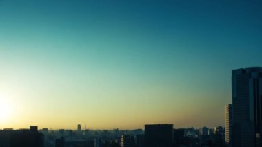 Video of sky, clouds, city and buildings, night view from sunset