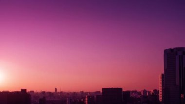 Video of sky, clouds, city and buildings, night view from sunset