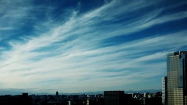 Video of sky, clouds, city and buildings, daytime