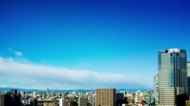 Video of sky, clouds, city and buildings, daytime