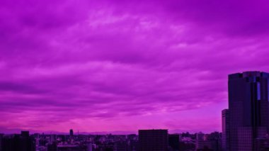 Video of the sky, clouds, towns and buildings, from daytime to sunset
