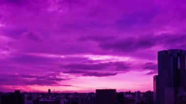 Video of the sky, clouds, towns and buildings, from daytime to sunset