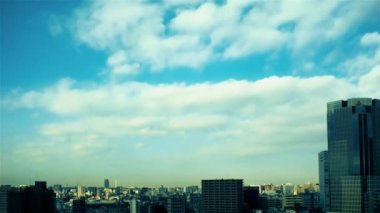 Video of sky, clouds, city and buildings, daytime